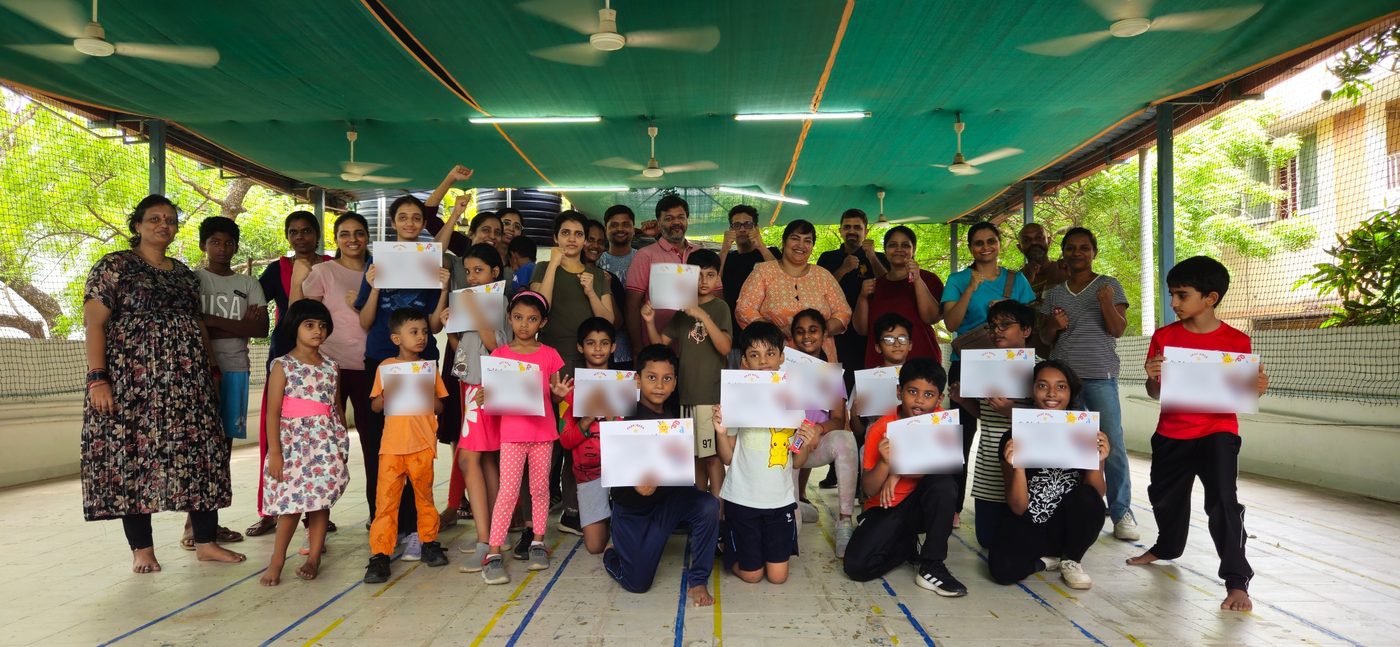Junior Warriors Krav Maga students with their parents and instructor, holding certificates of completion